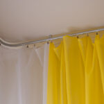 How Can You Install a Corner Window Curtain Track?
